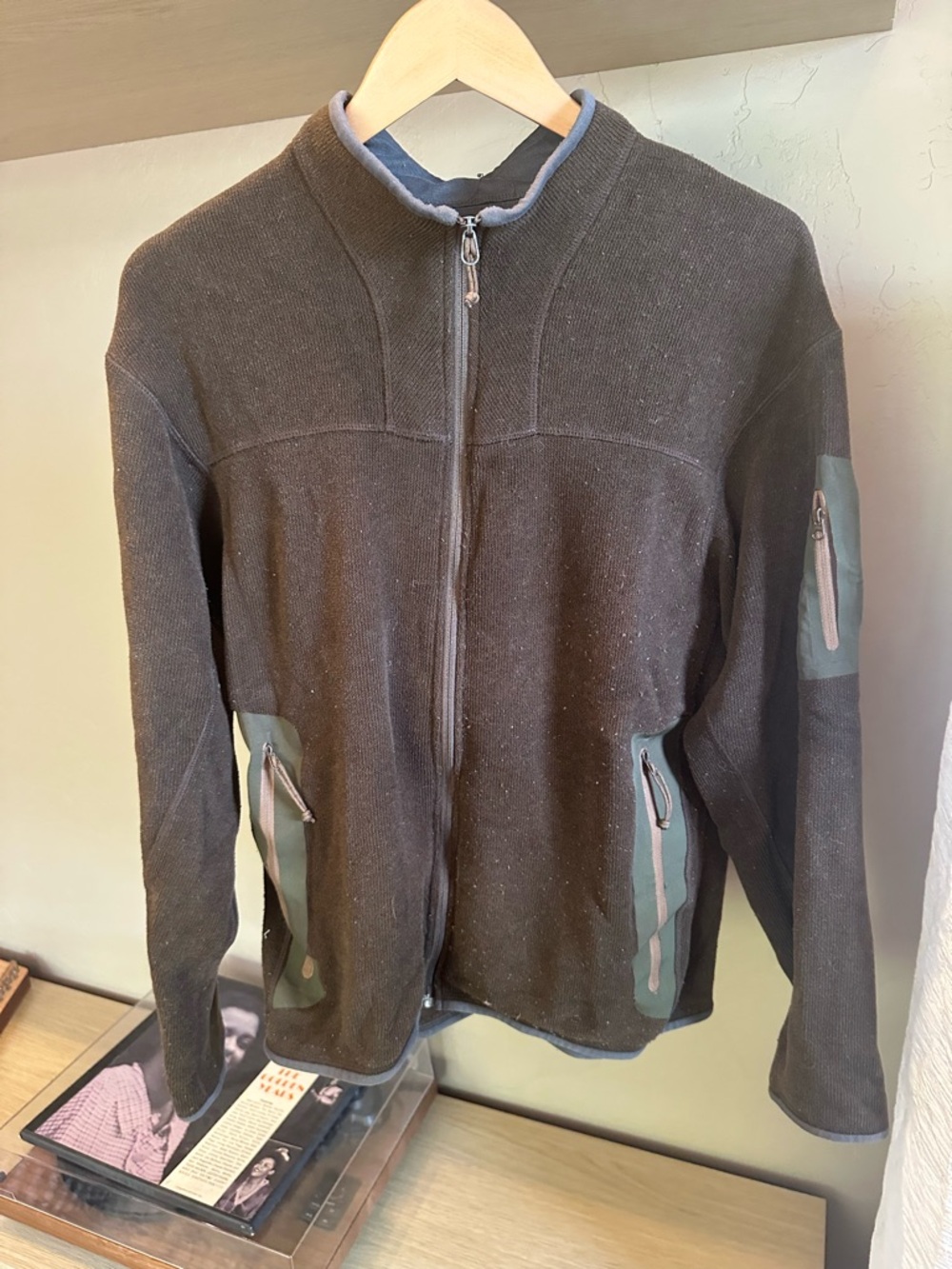 Arc'teryx brown crew top with subtle logo